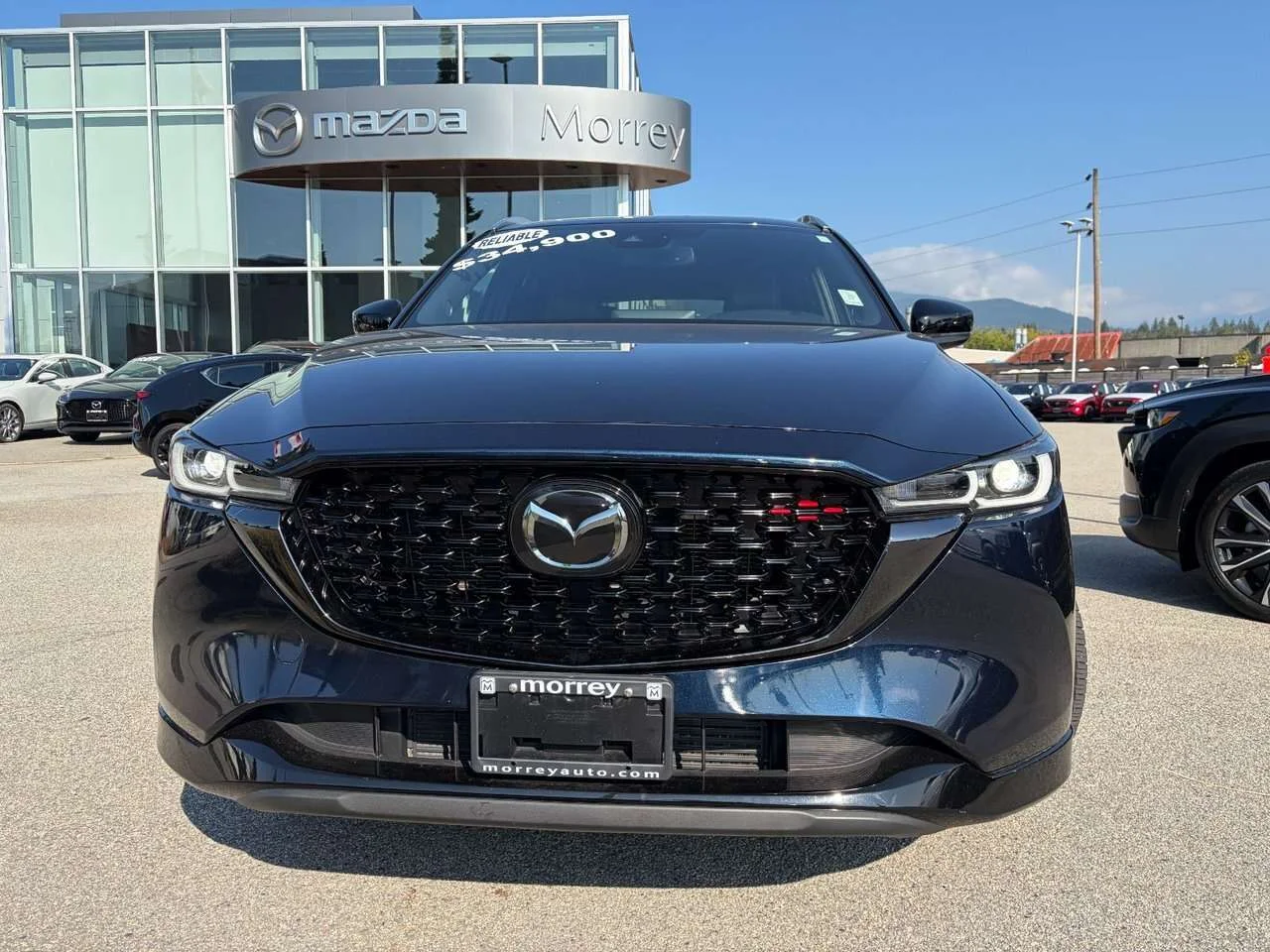 Used 2023 Deep Crystal Blue Mica Mazda Sport Design image 2