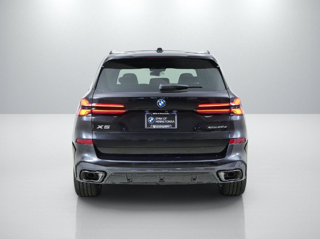 New 2026 Black Sapphire Metallic BMW xDrive50e image 10