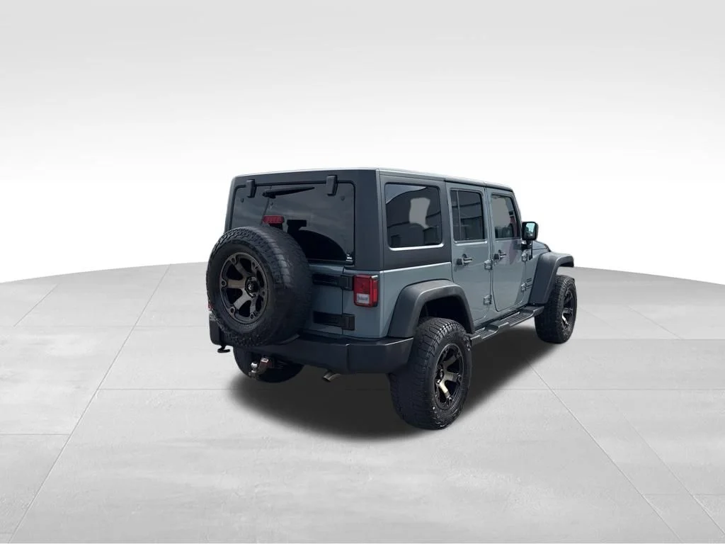 Used 2014 Gray Jeep Unlimited Sport image 5