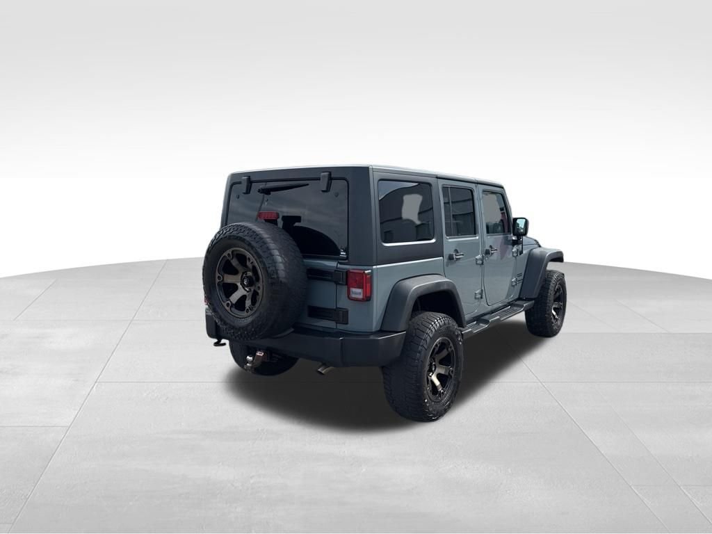 Used 2014 Gray Jeep Unlimited Sport image 5