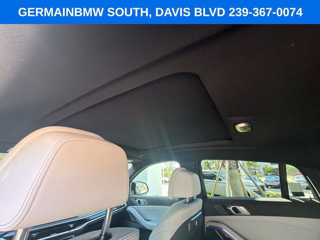 Certified Used 2024 Tanzanite Blue II Metallic BMW M60i image 21