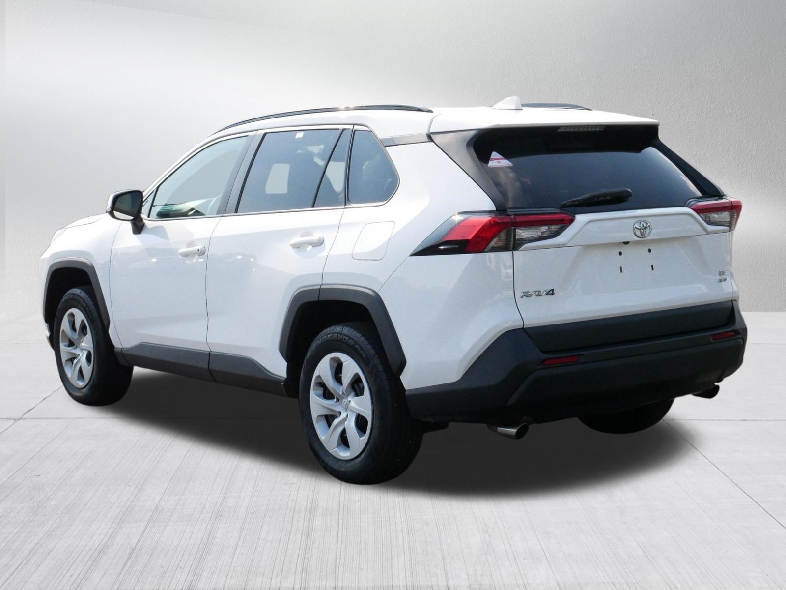 Used 2021 Super White Toyota LE image 5
