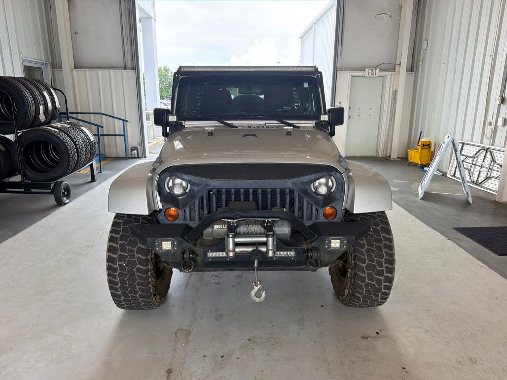Used 2012 Silver Jeep Unlimited Sahara image 3
