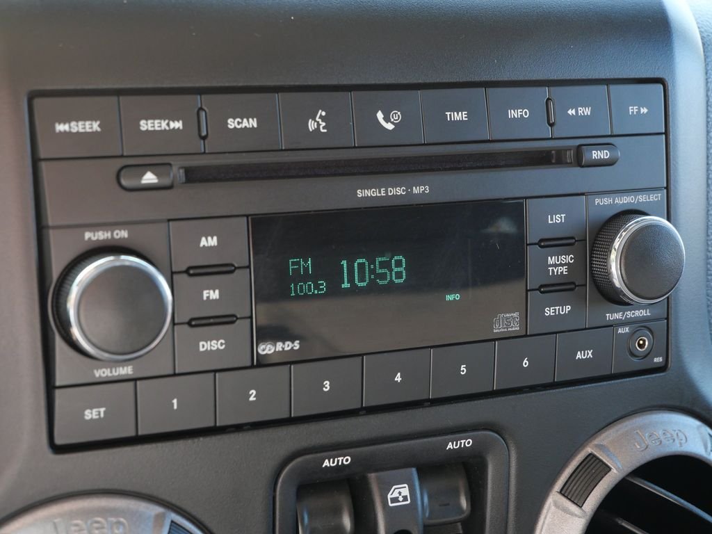 Used 2013 Black Jeep Unlimited Sport image 22