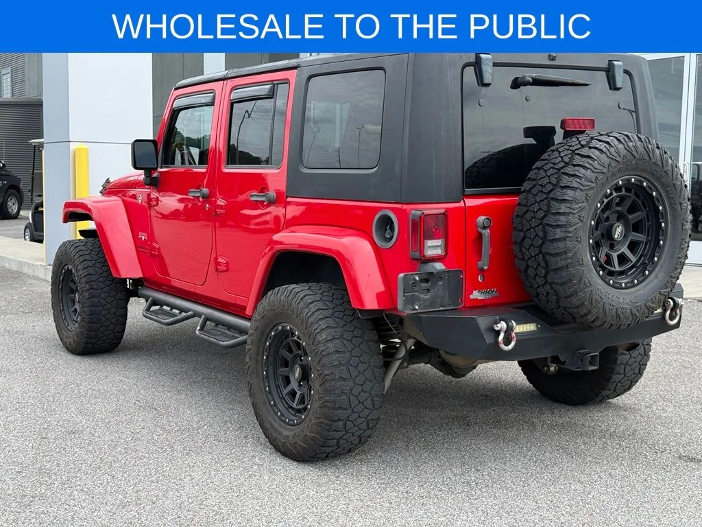 Used 2016 Red Jeep Unlimited Sahara image 3