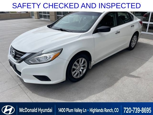 Used 2016 White Nissan 2.5 S image 1