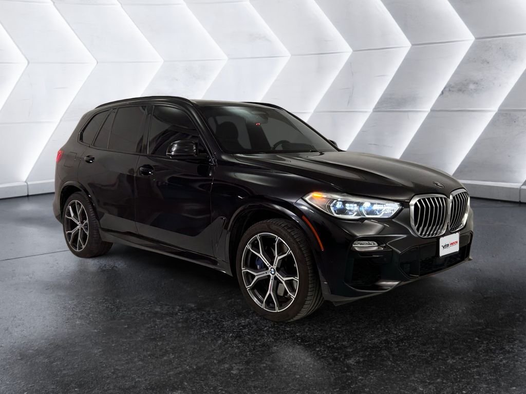 Used 2019 Black BMW xDrive50i image 1