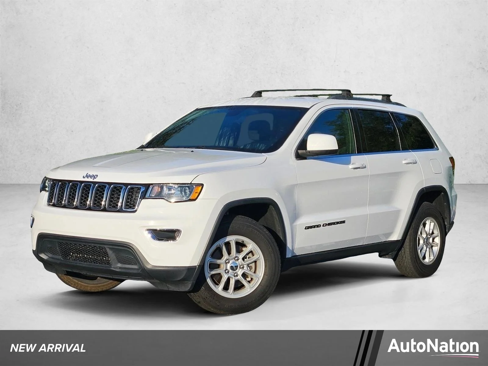 Used 2020 Bright White Clearcoat Jeep Laredo E image 1