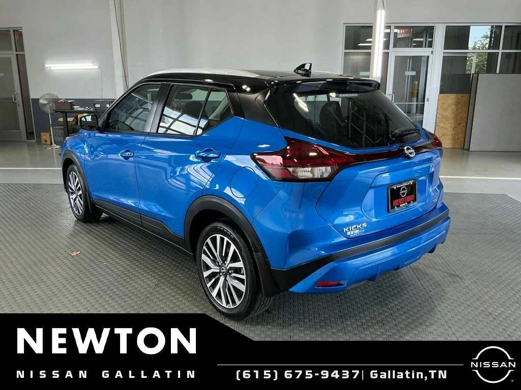 Used 2023 Electric Blue Metallic/Super Black Nissan SV image 19