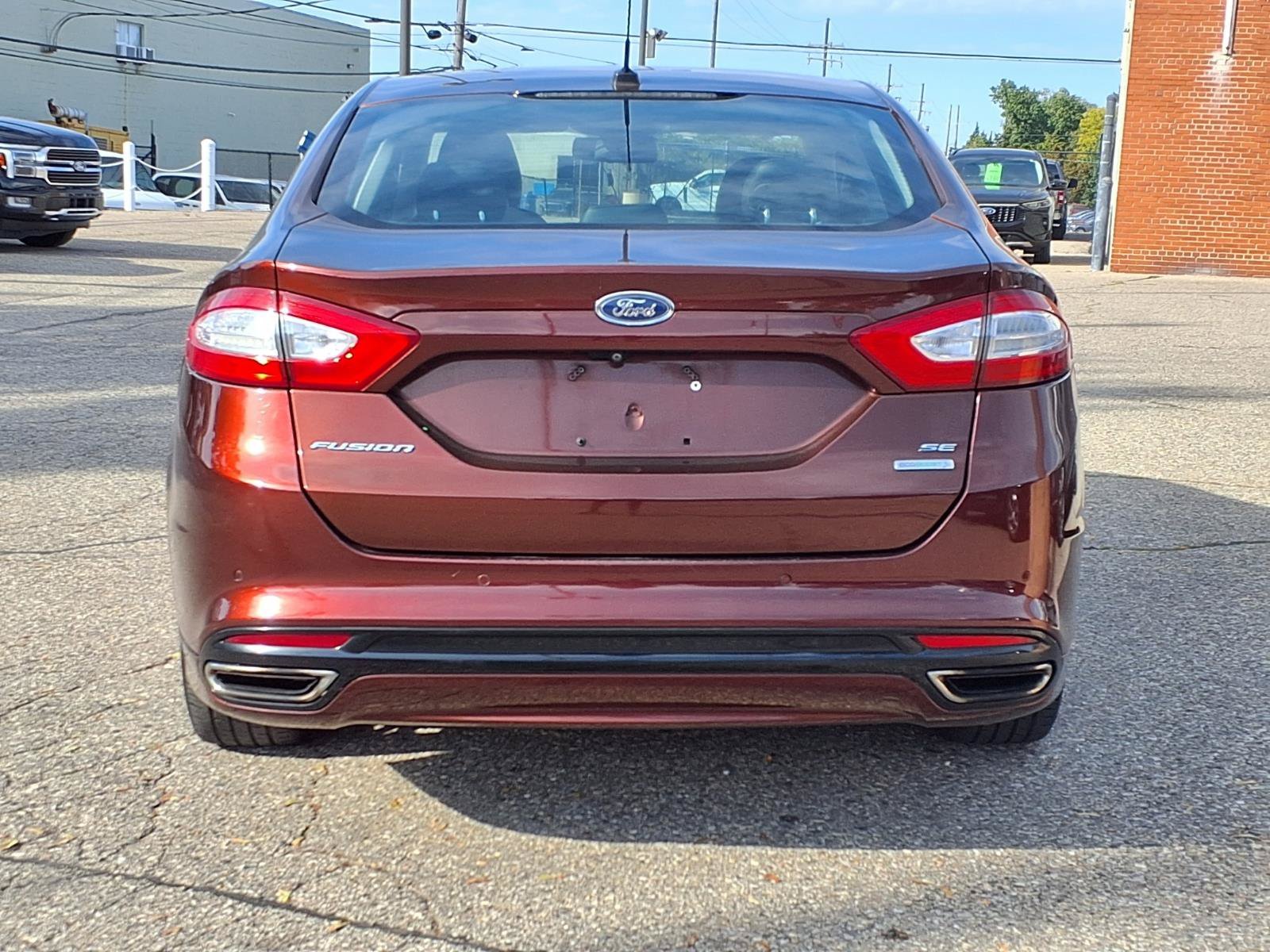 Used 2015 Bronze Fire Metallic Tinted Clearcoat Ford SE image 23