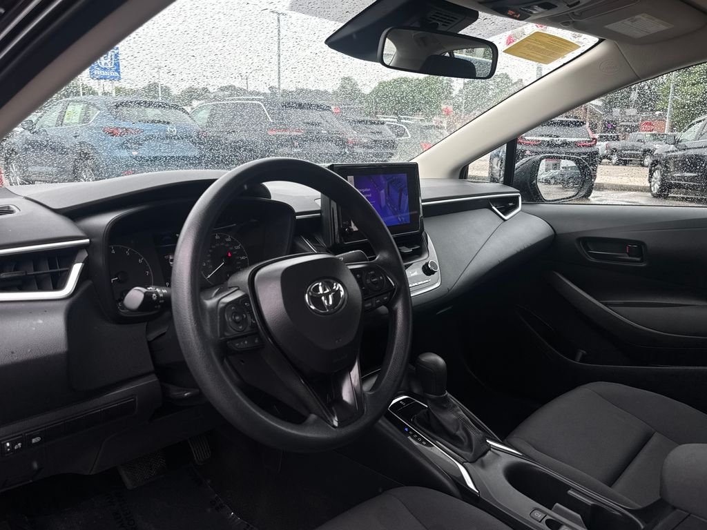 Used 2024 Black Toyota LE image 13