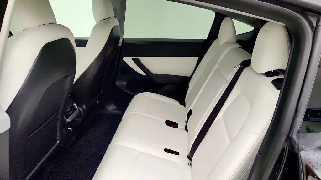 Used 2021 Solid Black Tesla Long Range AWD w/ White/Black 7-Seat Interior image 26