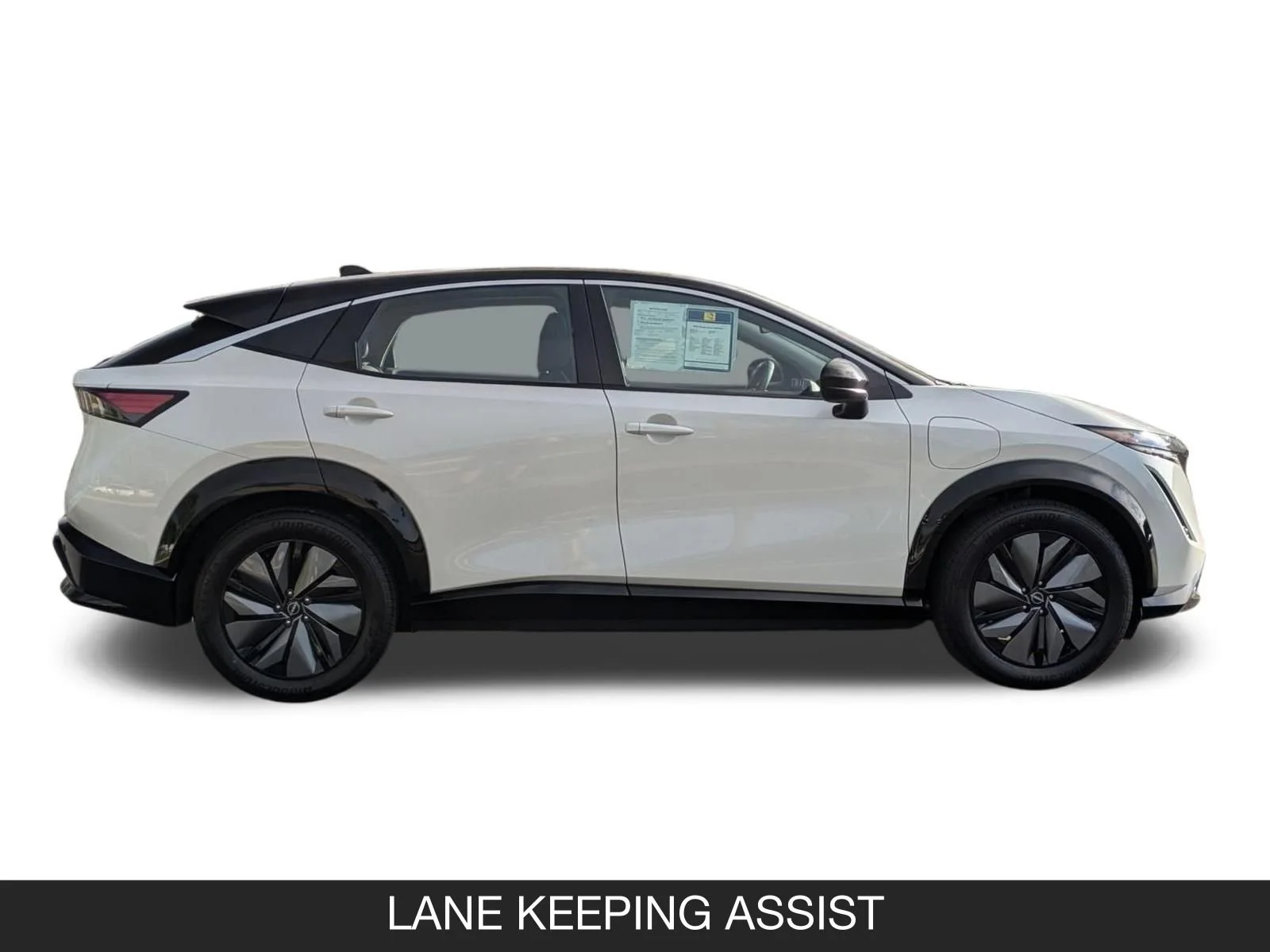 Used 2023 Everest White Pearl Tricoat/Black Diamond Pearl Nissan VENTURE+ image 6