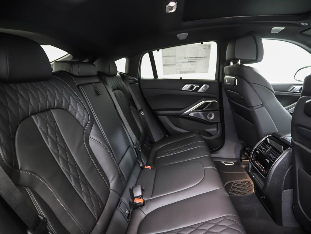 Used 2026 Black Sapphire Metallic BMW M60i image 27