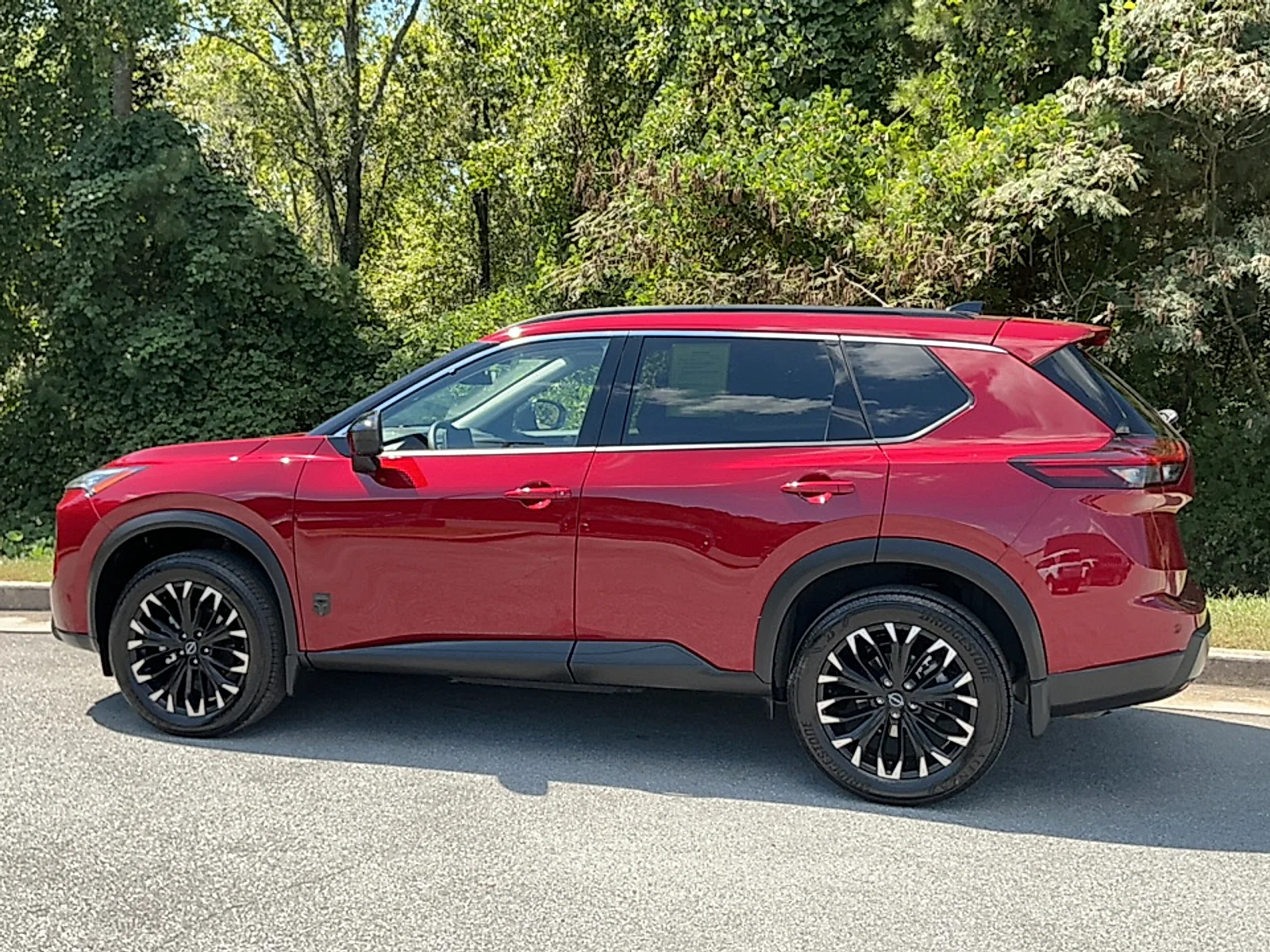 Used 2026 Scarlet Ember Tintcoat Nissan Dark Armor image 3