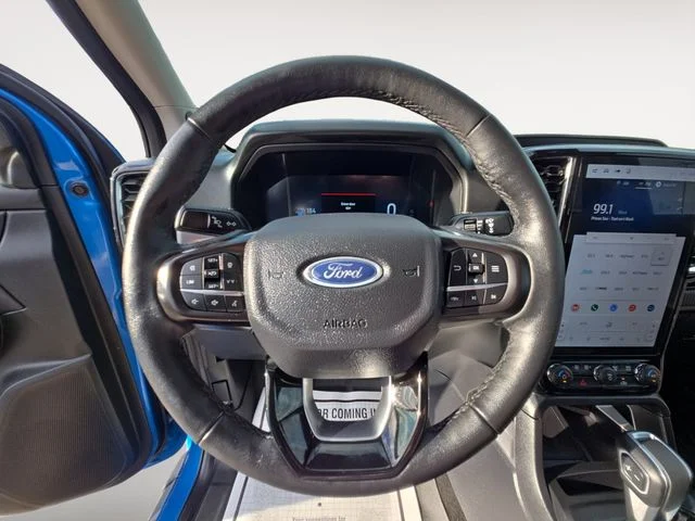 Certified Used 2025 Blue Metallic Ford Lariat image 13