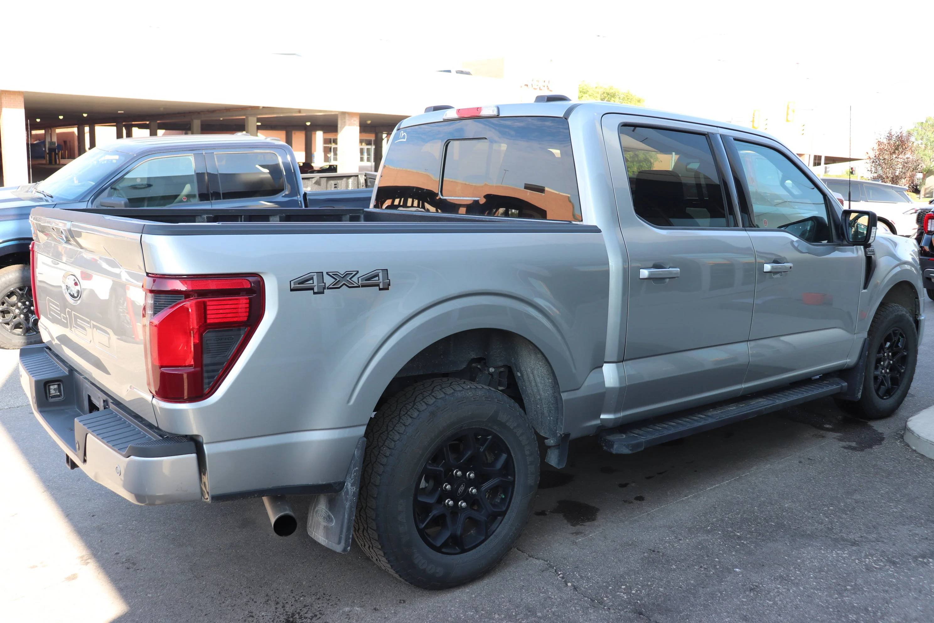 Used 2024 Silver Ford XLT 4WD SuperCrew 5.5