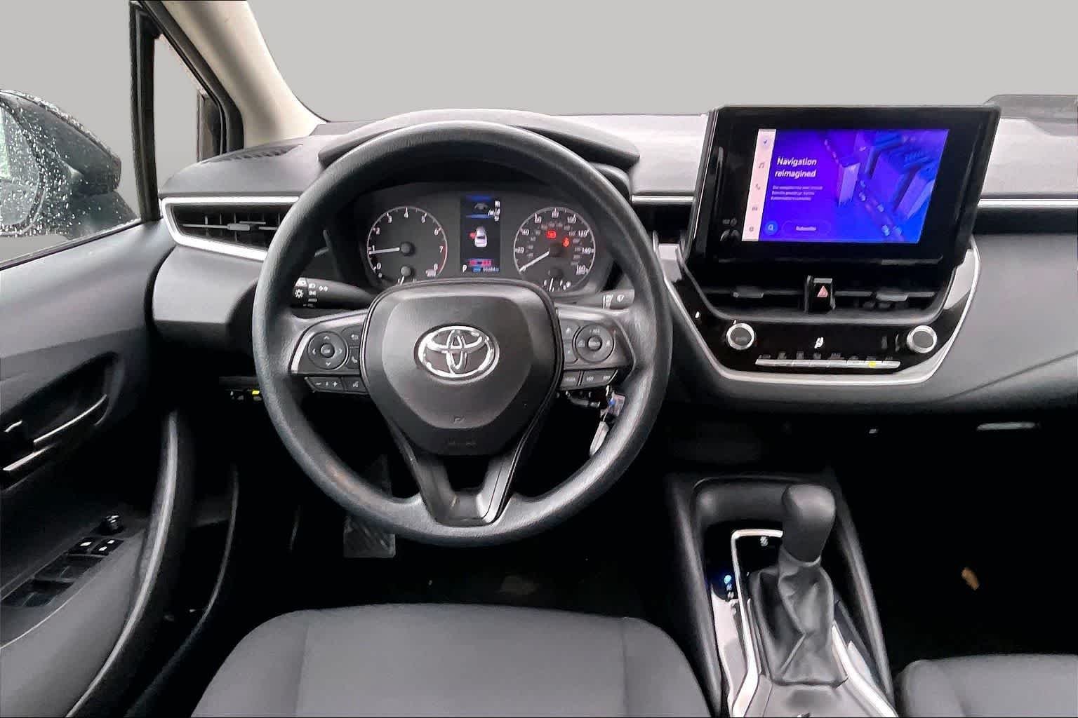Used 2024 Midnight Black Metallic Toyota LE image 6