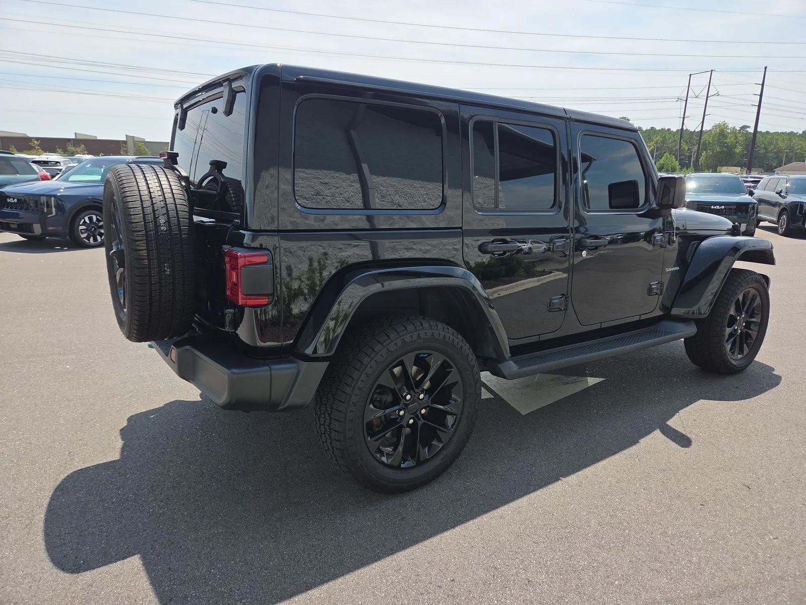 Used 2023 Black Clearcoat Jeep Sahara 4xe image 5