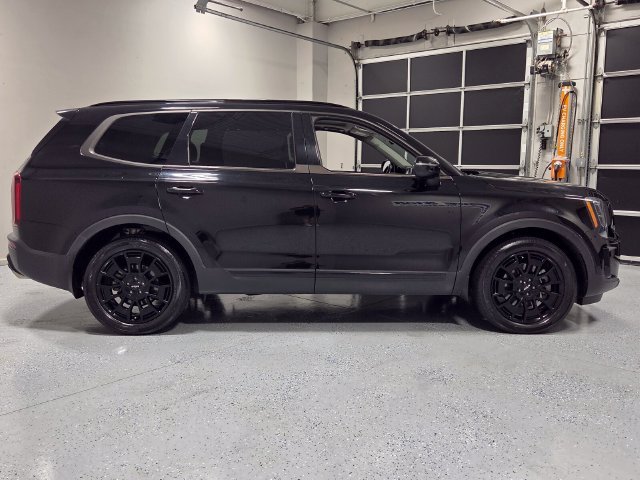 Used 2022 Black Kia EX image 16