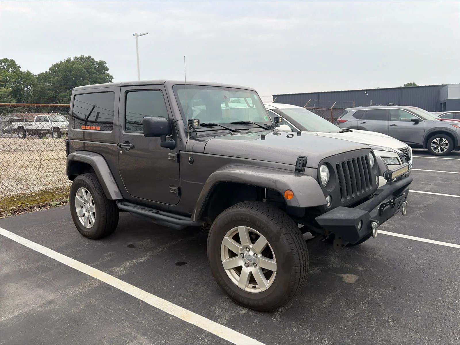 Used 2017 Granite Crystal Metallic Clearcoat Jeep Sahara image 3