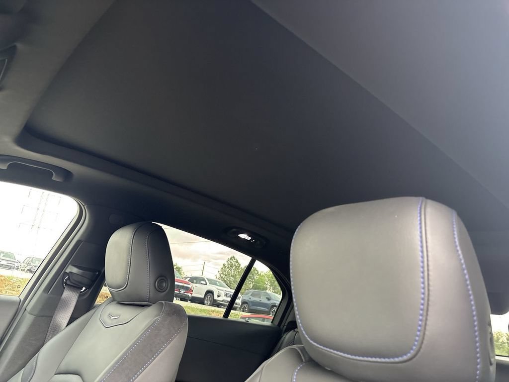Used 2025 Radiant Red Tintcoat Cadillac Sport image 24