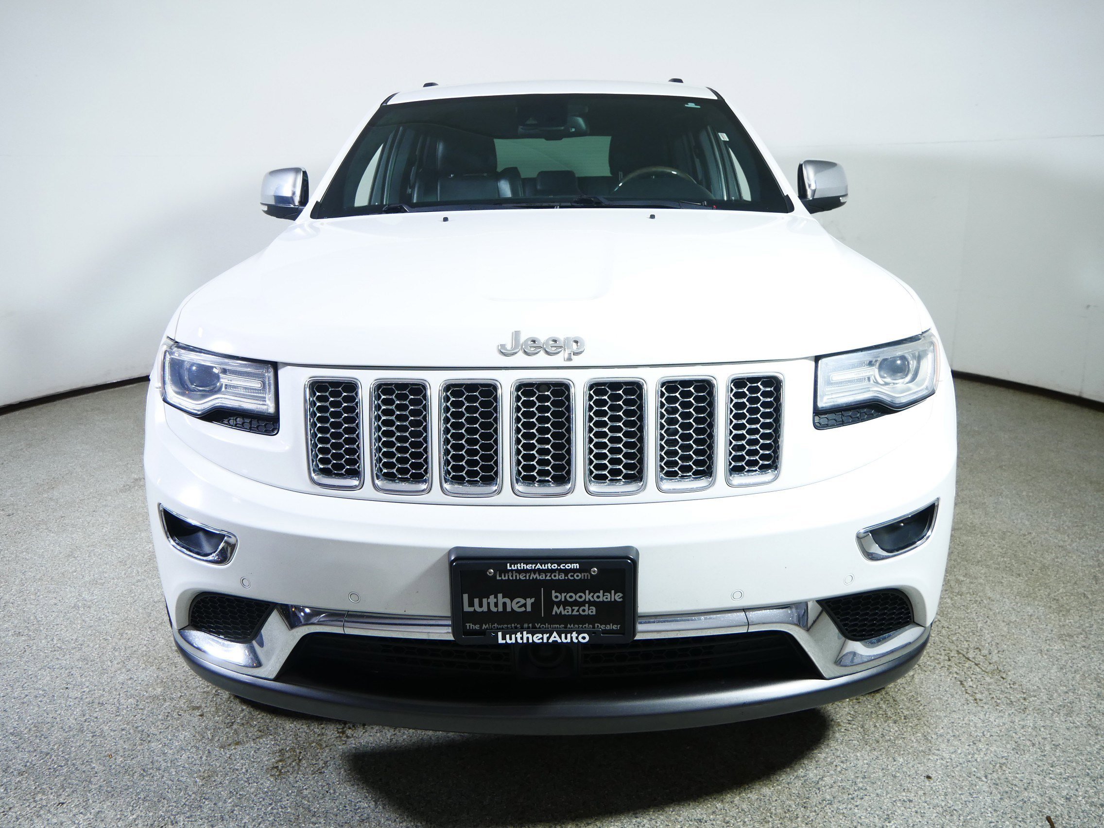 Used 2014 Jeep Grand Cherokee Summit with VIN 1C4RJFJG7EC233463 for sale in Brooklyn Center, Minnesota