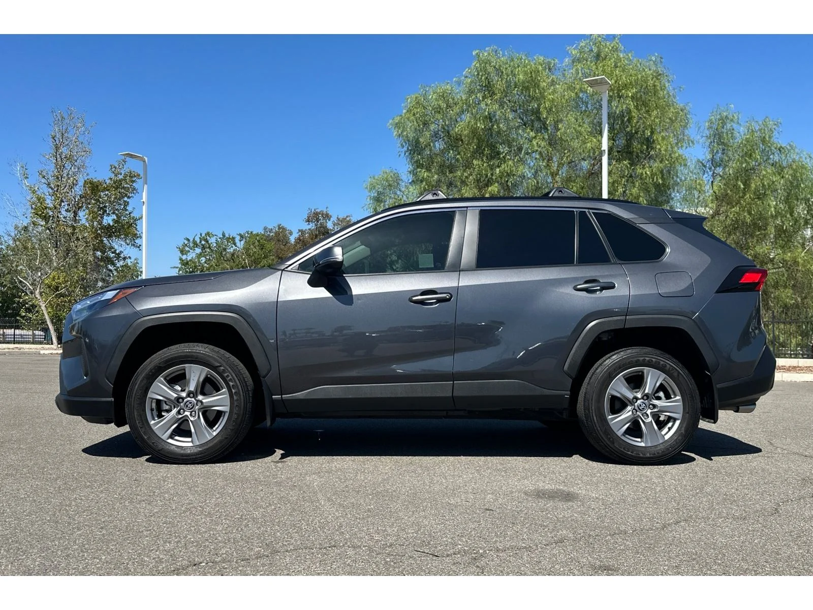 Used 2024 Magnetic Gray Metallic Toyota XLE image 2