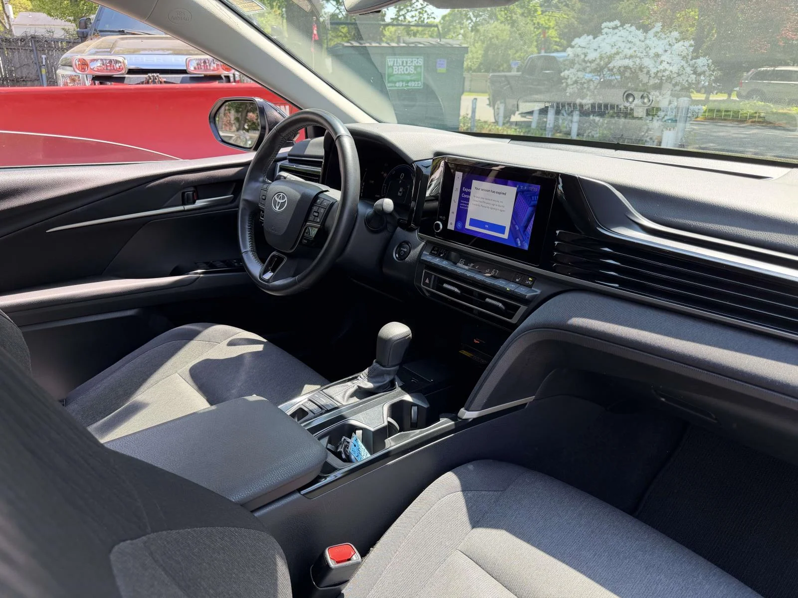 Used 2025 Black Toyota LE image 8