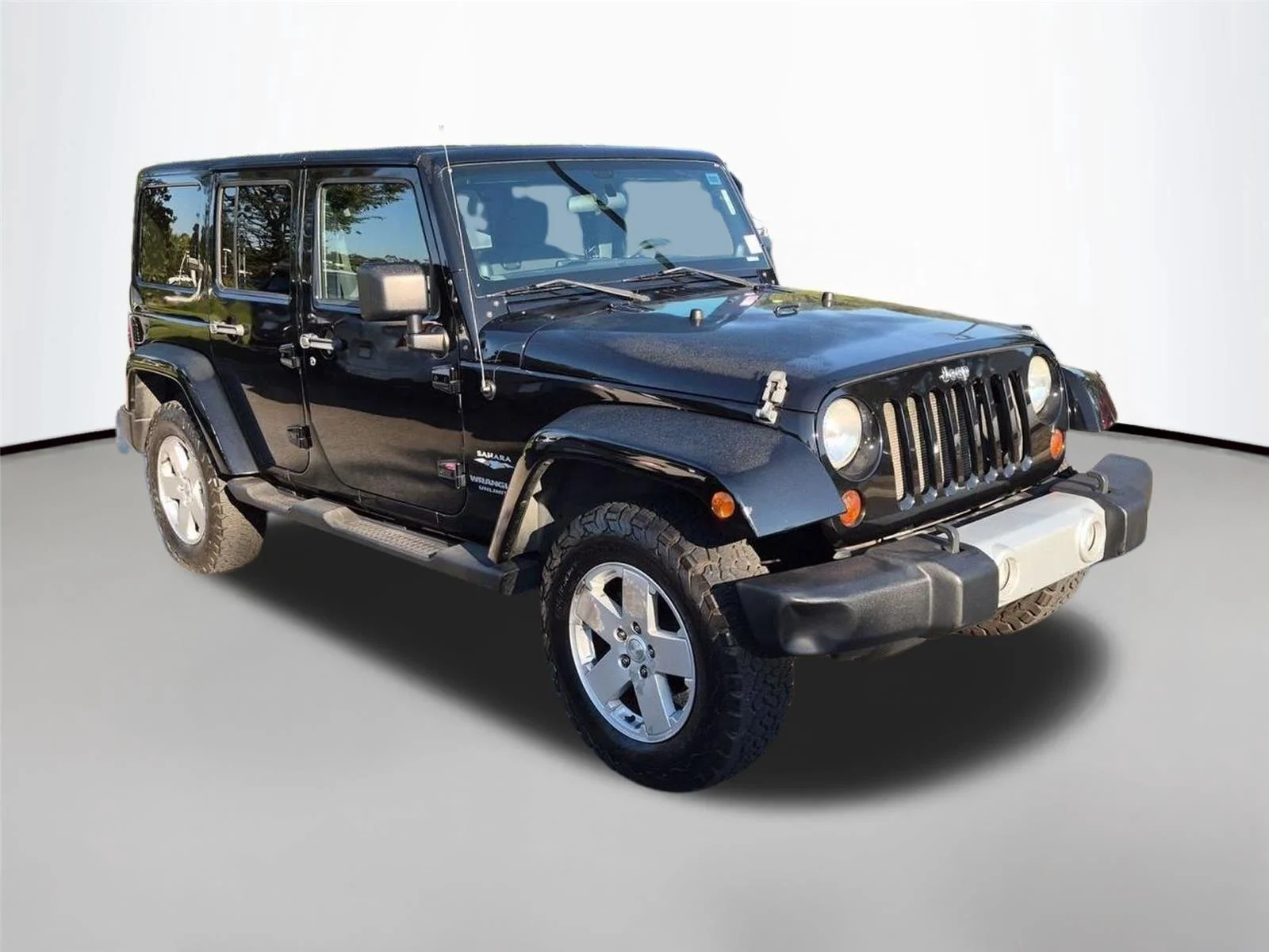 Used 2011 Black Clear Coat Jeep Sahara image 6