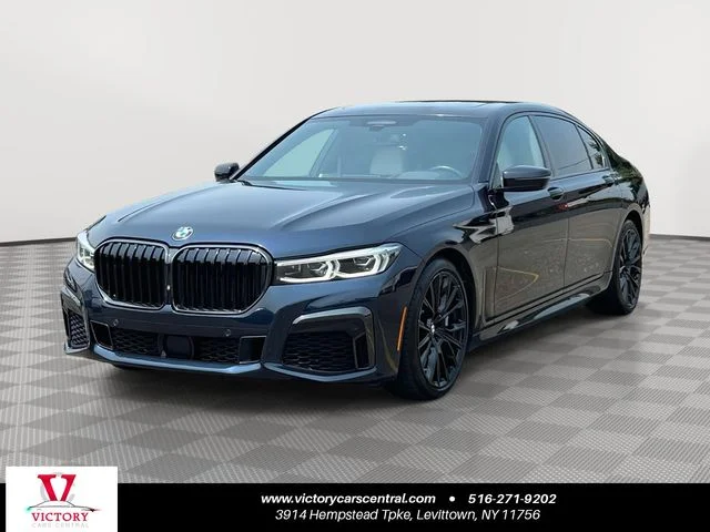 Used 2022 Black BMW 750i xDrive image 1