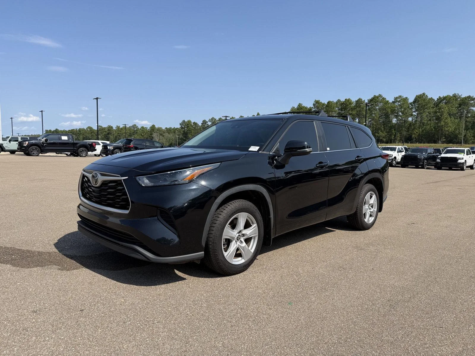 Used 2023 Midnight Black Metallic Toyota L image 1