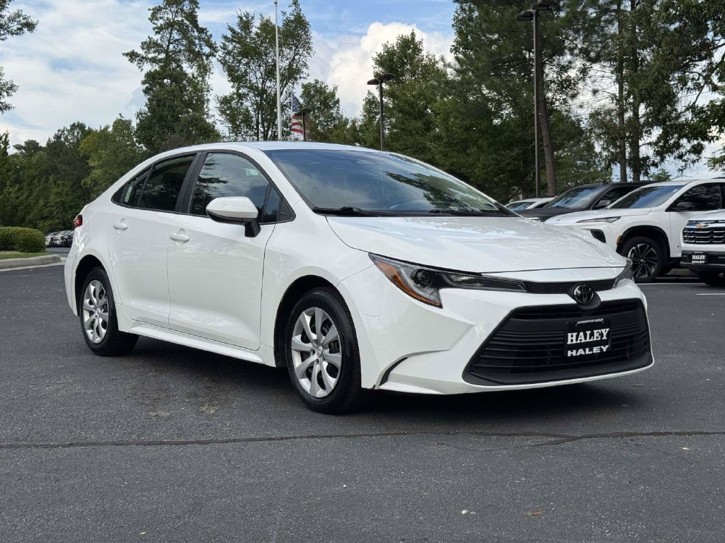 Used 2025 White Toyota LE image 2