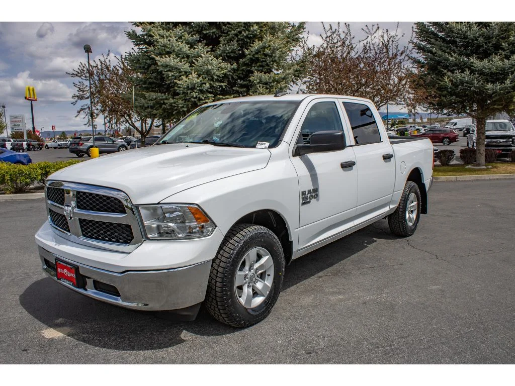 Used 2023 Bright White Clearcoat Ram SLT image 4