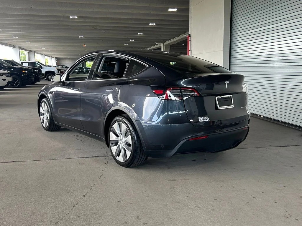 Used 2024 Tesla Model Y Long Range with VIN 7SAYGAEE6RF079796 for sale in Miami Lakes, FL