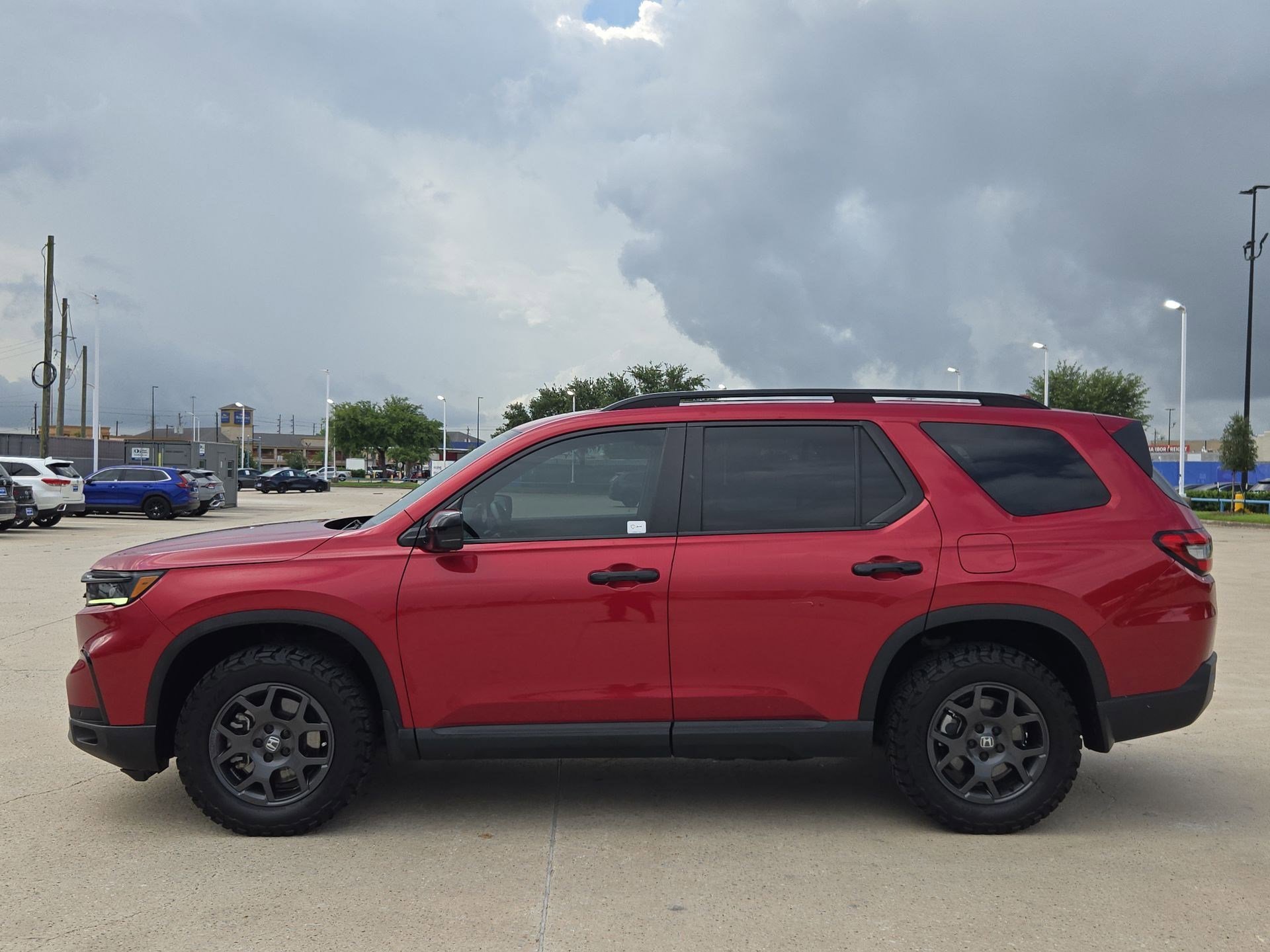 Certified Used 2024 Radiant Red Metallic II Honda AWD TRAILSPORT image 6