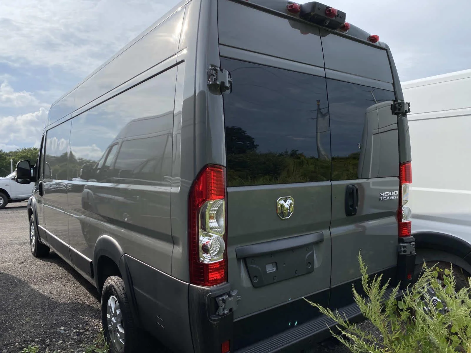 Used 2025 Ceramic Gray Clearcoat Ram SLT+ image 4