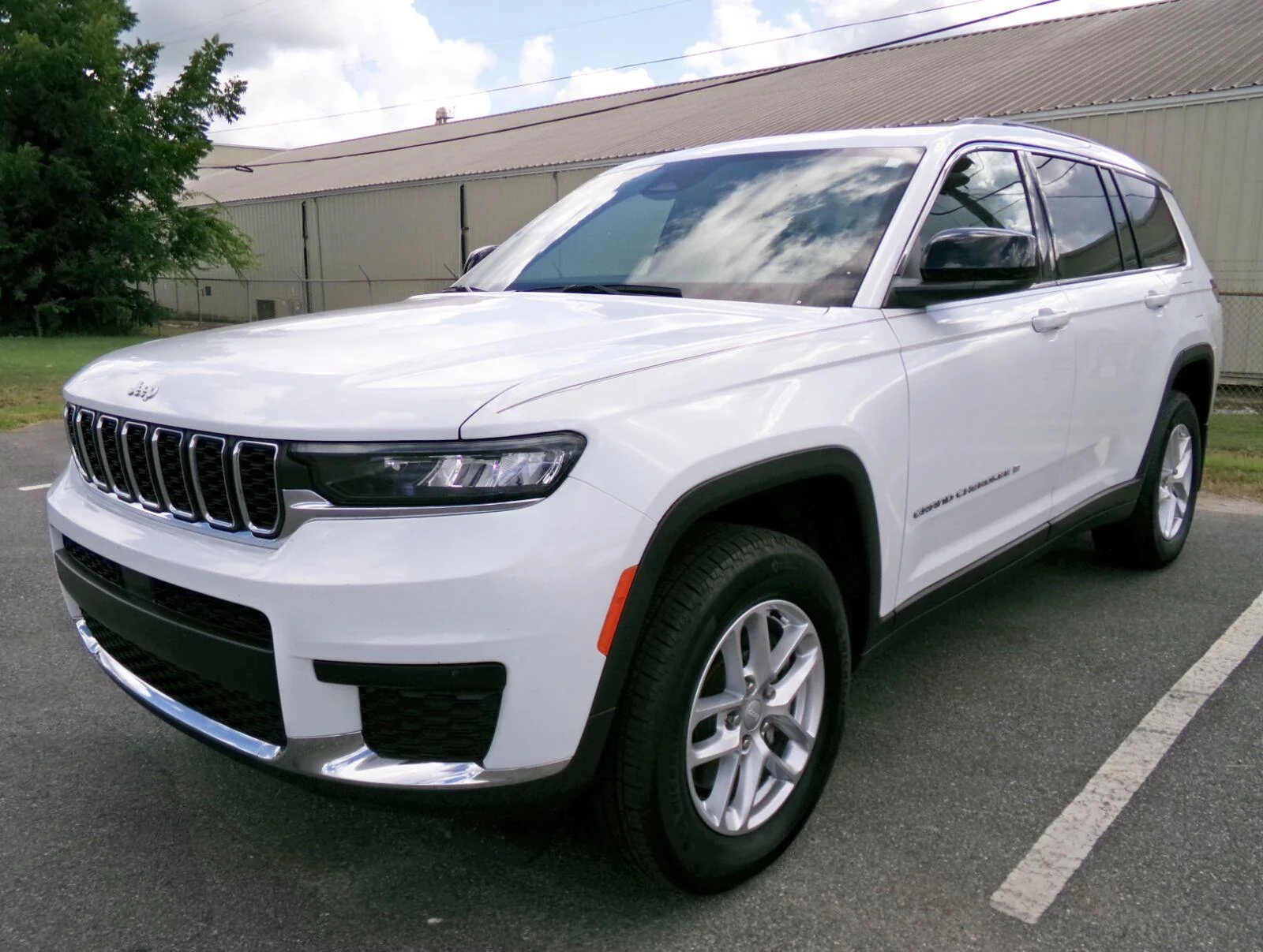 Used 2025 Bright White Clearcoat Jeep Laredo image 1