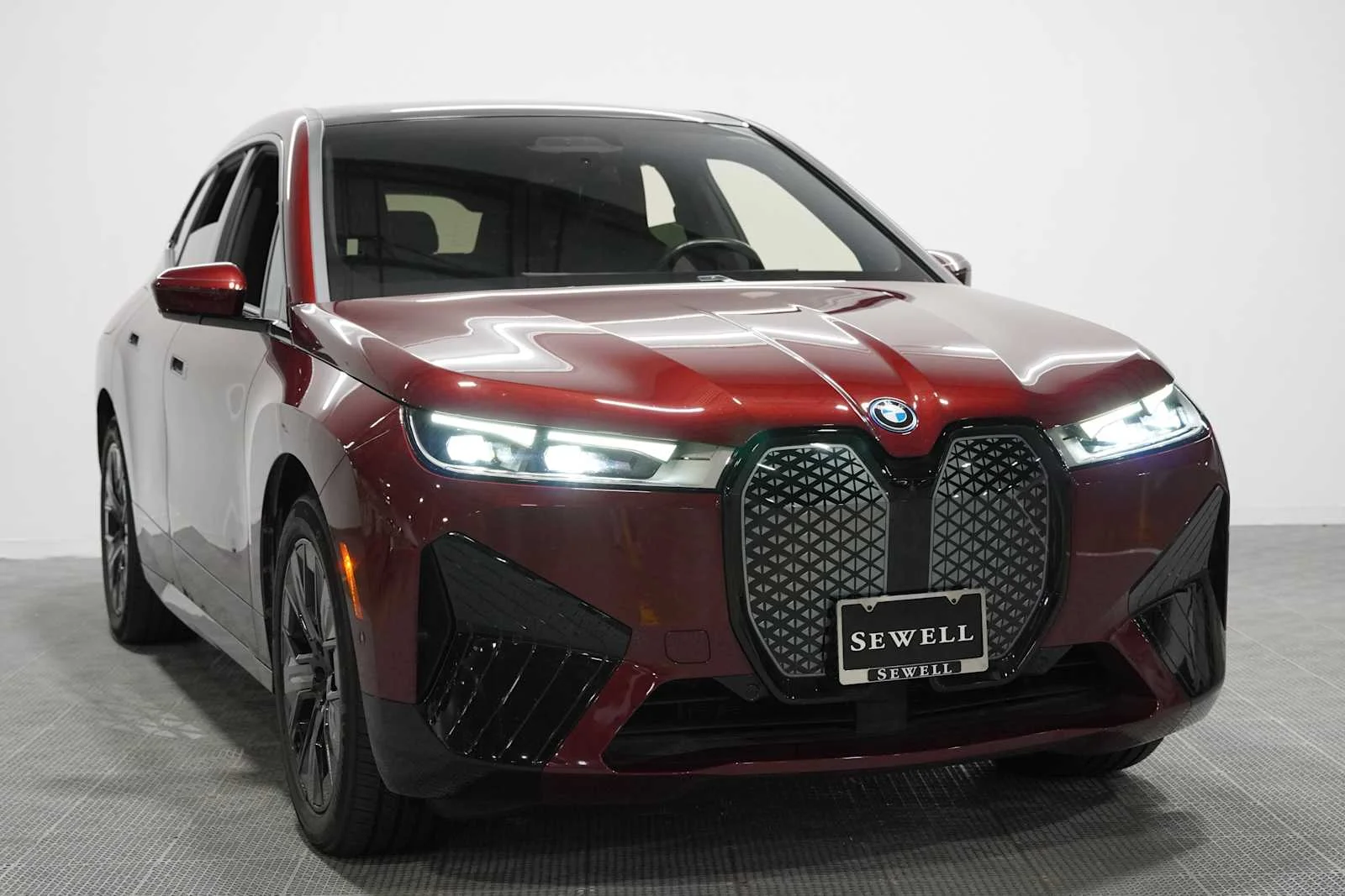 Certified Used 2024 Aventurin Red Metallic BMW xDrive50 image 3