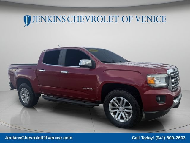 Used 2018 RED QUARTZ TINTCOAT GMC 4WD SLT image 1