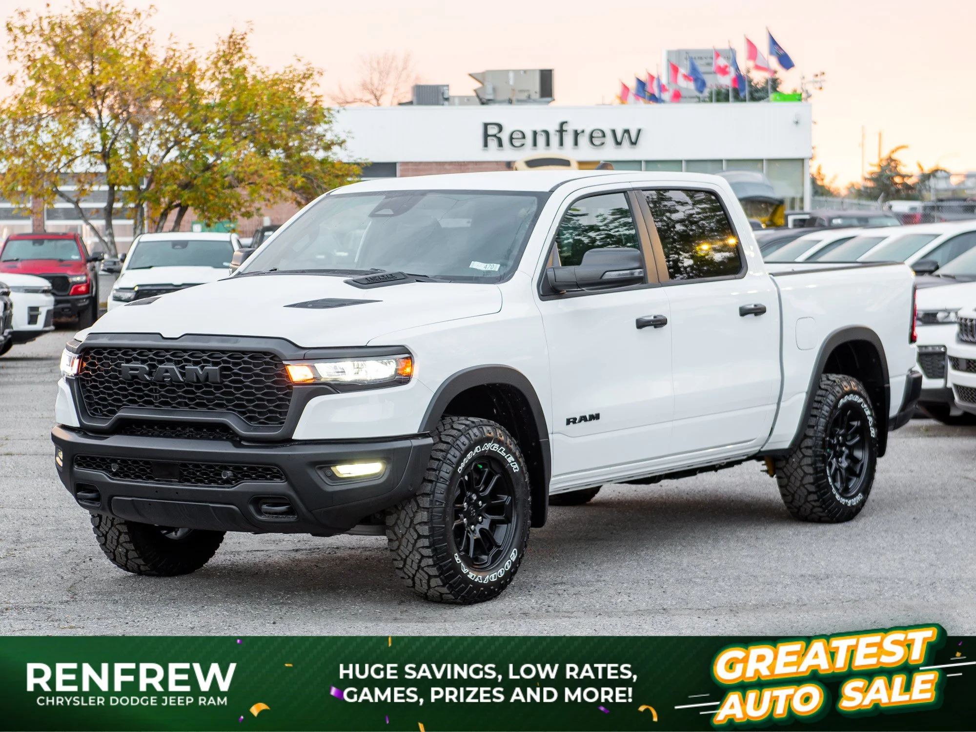 New 2026 White RAM Rebel* Crew Cab 4x4, Heated Seats/Wheel, 33 Inch A/T Tires, Rear Locking Diff image 1