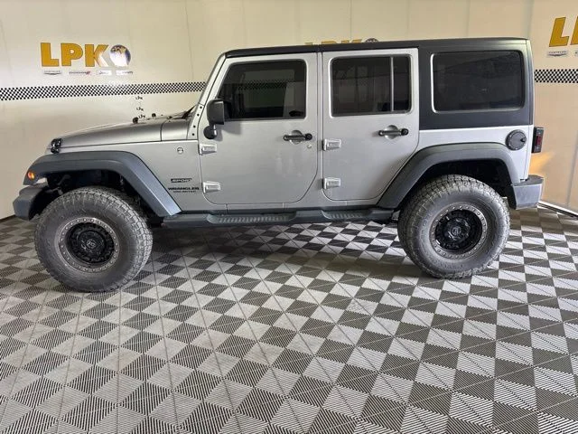 Used 2014 Billet Metallic Clearcoat Jeep Unlimited Sport image 6