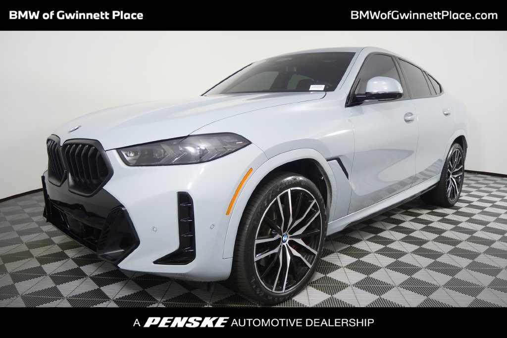 Certified Used 2024 Brooklyn Grey Metallic BMW xDrive40i image 1