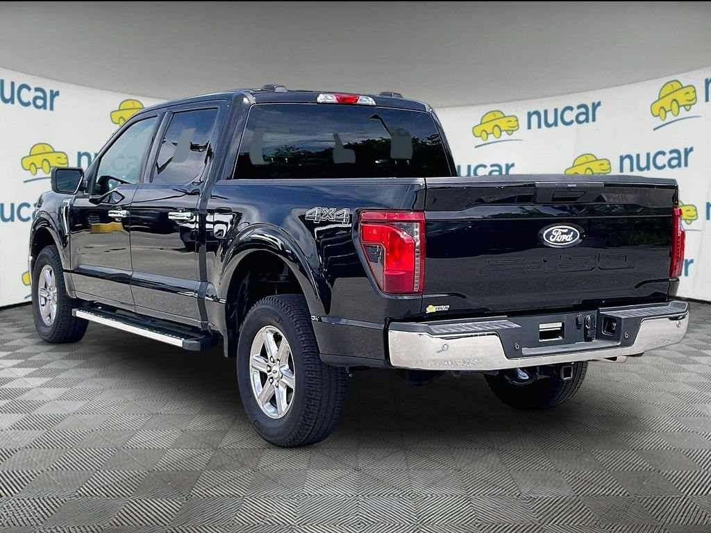 Used 2025 Agate Black Metallic Ford XLT image 4
