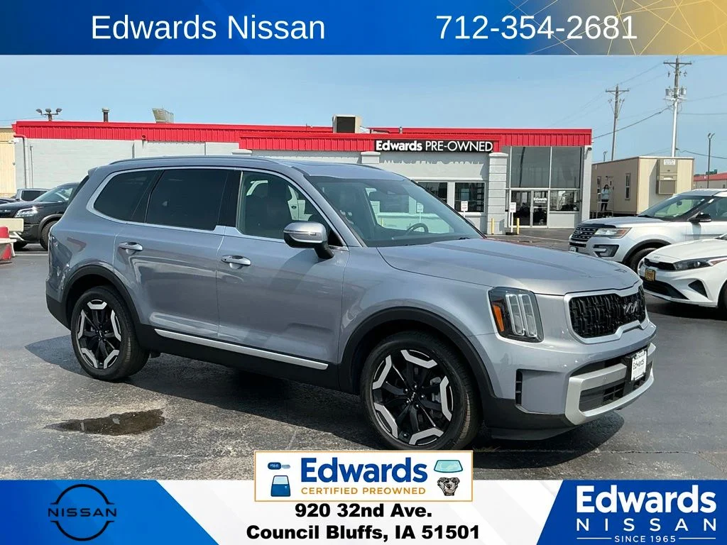 Used 2023 Silver Kia EX image 1