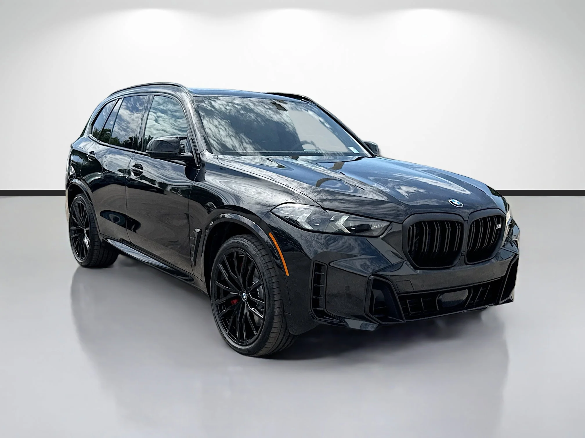 New 2026 Black Sapphire Metallic BMW M60i image 1
