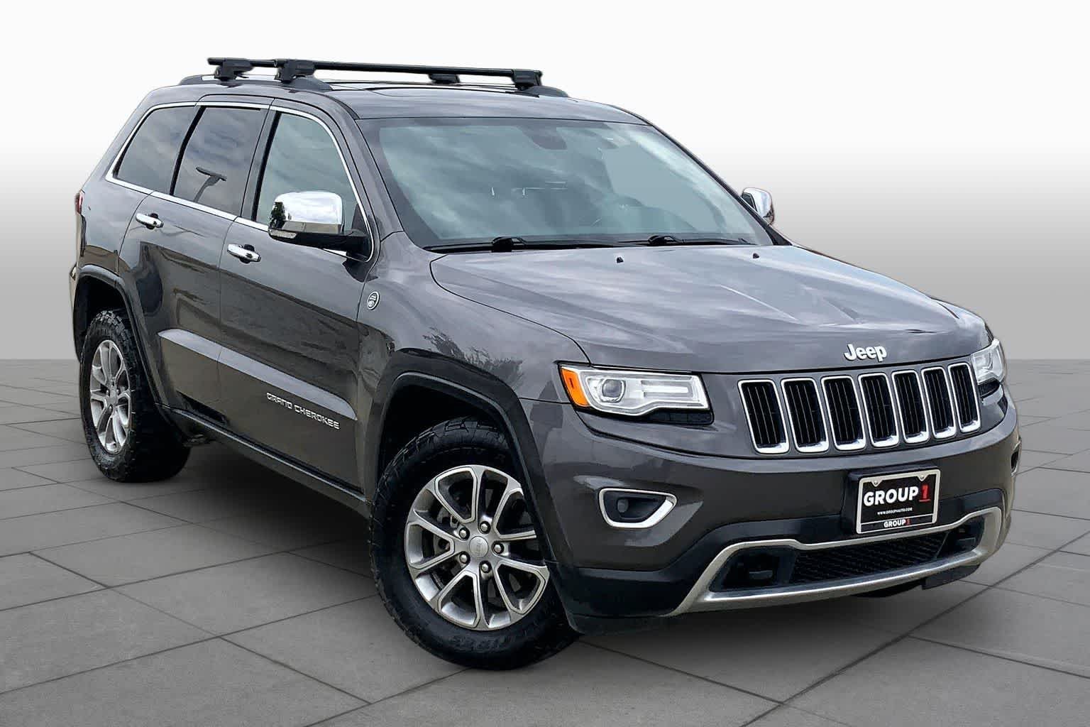 Used 2015 Granite Crystal Metallic Clearcoat Jeep Limited image 3