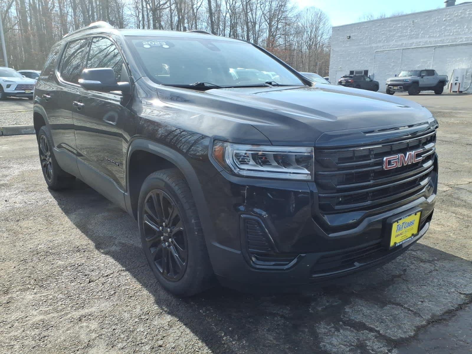 Certified Used 2023 Ebony Twilight Metallic GMC SLE image 1