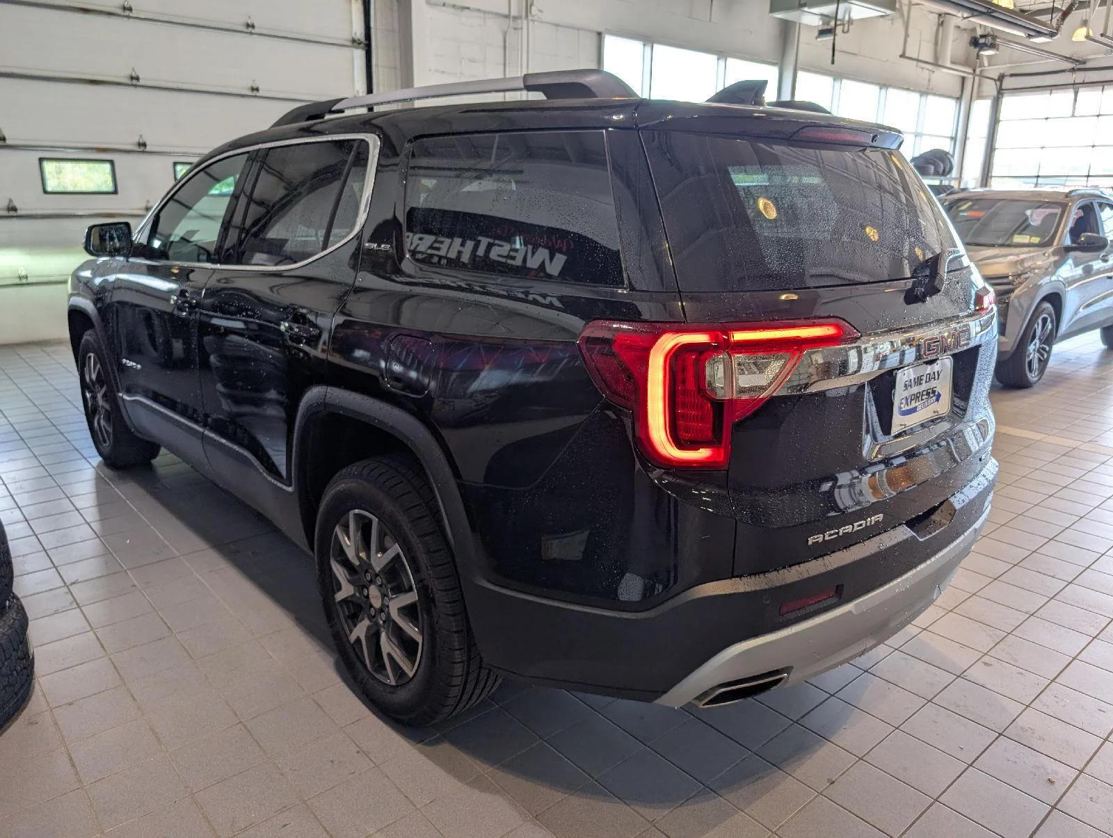 Used 2023 Ebony Twilight Metallic GMC SLE image 5