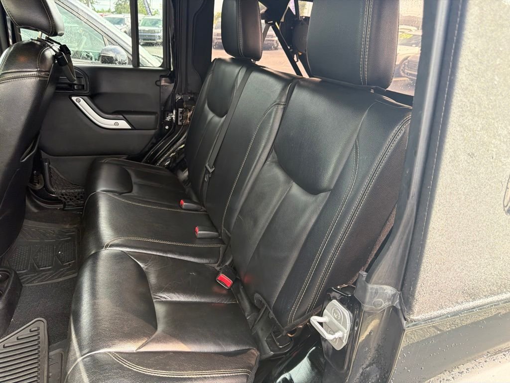 Used 2013 Black Jeep Unlimited Sahara image 8